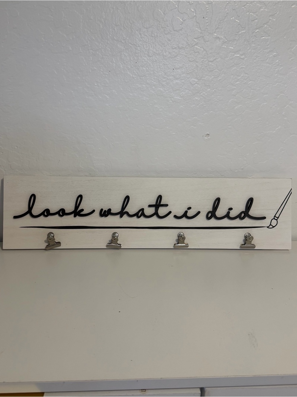 Kirkland Signature White Wall Clip Display with Black Script “Look what I did”